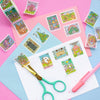 Paper Washi Tape Rolls Stamp Designs featuring Porthaven, Neverland, A Galaxy Far Far Away, Tulgey Woods, The Magical Castle for Wizards, Pemberley, Wizard of Oz, The Safari Dinosaur Island, The Wardrobe, Bag End, Dune, Anne of Green Gables