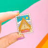 Hand holding Asgard Postal Stamp Enamel Pin