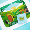 8 x 10 Framed Art Print Mockup of Bag End with matching stamp enamel pin