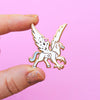 Hand Holding Magical Hippogriff Patronus Enamel Pin Black