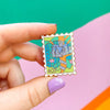Hand Holding Stamp Enamel Pin Lorien