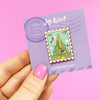 Hand Holding Stamp Enamel Pin of Wizard of Oz