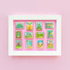 Colorful Display of Mix and Match Stamp Enamel Pin Set, Porthaven, Neverland, A Galaxy Far Far Away, Tulgey Woods, The Magical Castle for Wizards, Pemberley, Wizard of Oz, The Safari Dinosaur Island, The Wardrobe, Bag End, Dune, Anne of Green Gables