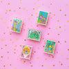 Group shot of Stamp Enamel PIns Atlantica, Neverland, Tulgey Woods, Beast's Castle, The Tower