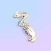 Hand holding Magical Wand Enamel In in White with magical sparkles