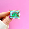 Hand Holding Stamp Enamel Pin of Neverland