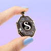 Hand Holding The Locket Dark Magical Object Enamel Pin for Wizardry and Spells